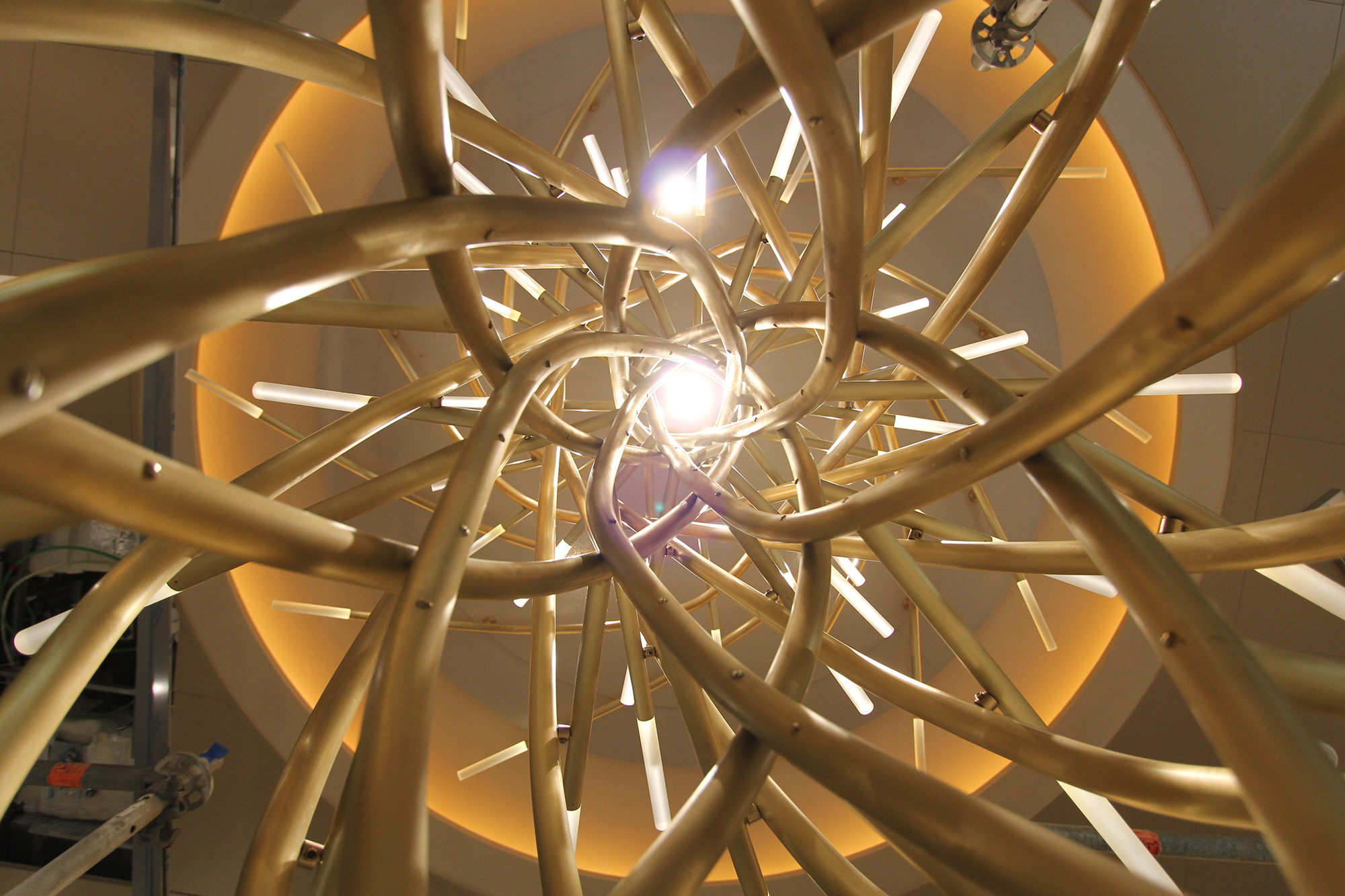 Looking upwards through the 21-ft height of the sculpture. The central
       radial geometry compounds to draw the view upwards.